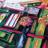 Close-up of hanging flowers and ornate green and gold columns in the Morning Star watercolour print.