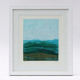 An abstract mountain scape print by Danielle Morgan. A golden haze casts over the land in winter sun. 